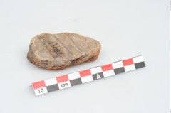 Etikett zu Schleifstein (NHMW-PRAE-078092)